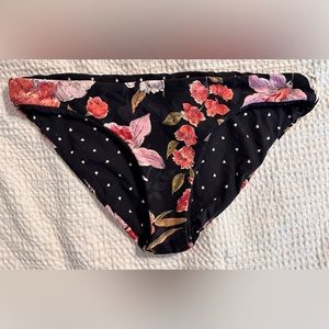 Billabong reversible bikini bottoms. Floral/teardrop pattern. Size LG